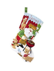 Bucilla felt christmas stocking kit. Design features Santa as the grillmaster serving up hotdogs, burgers and corn to his animals buddies.