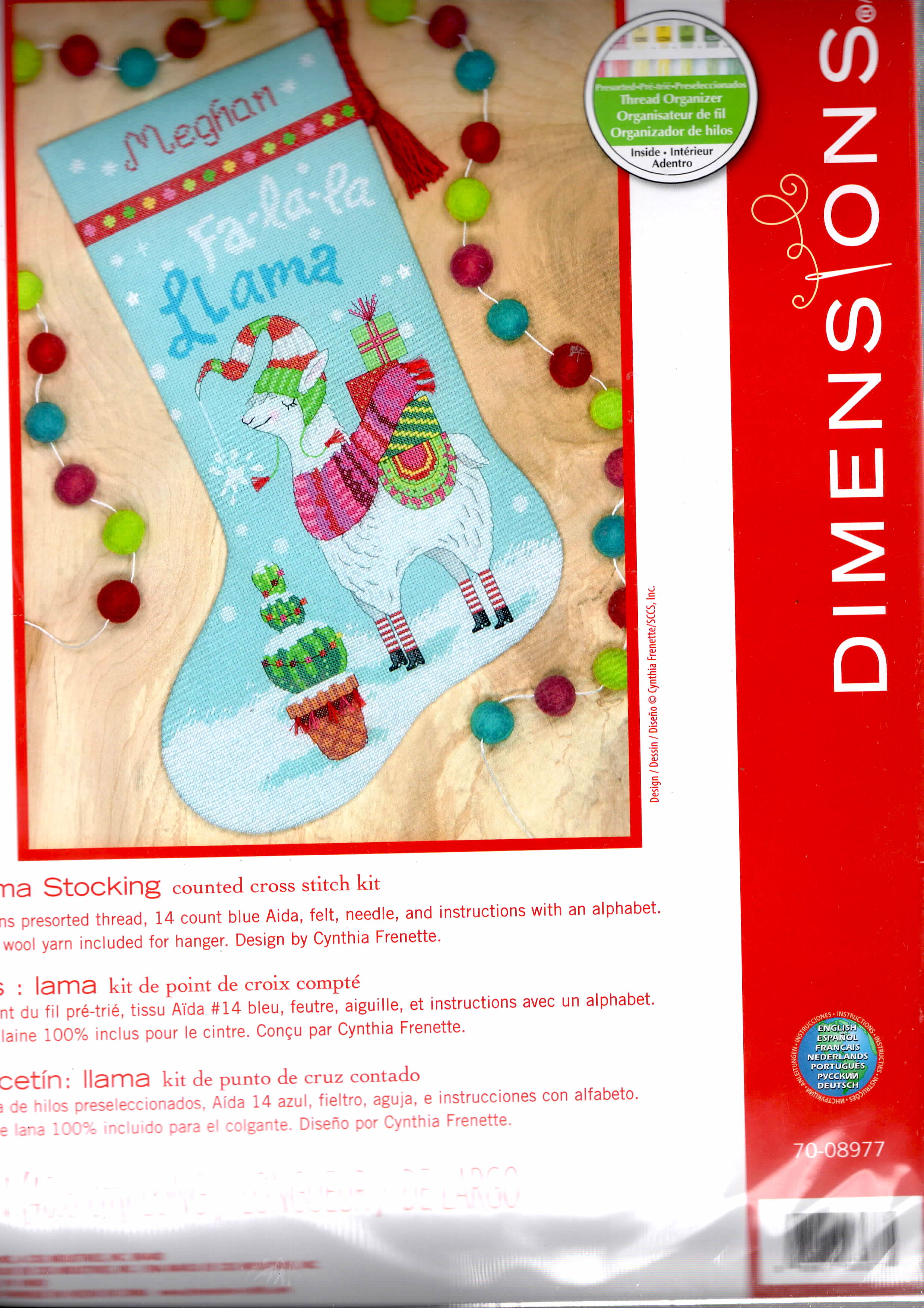 Dimensions counted cross stitch stocking kit. Design features a llama with gifts on his back and a cactus.