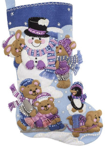 Bucilla felt stocking kit. Design features  a snowman with bears, bunnies, a dog and a penguin. Colors not his stocking kit are blues, pinks and purples. 