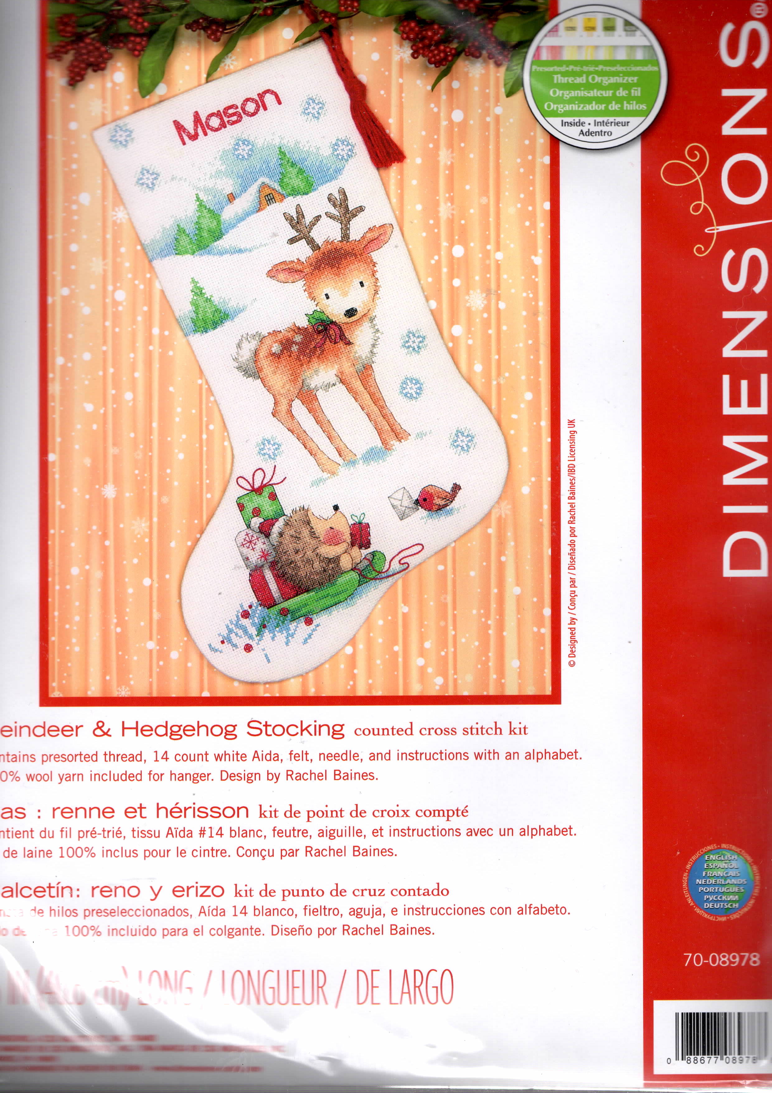 Dimensions counted cross stitch stocking kit. Design features a reindeer with a hedgehog on a sled with gifts.