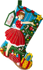 Bucilla felt christmas stocking kit. Design features a vintage style woman decorating a tree.
