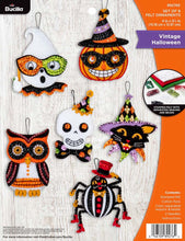 Load image into Gallery viewer, Bucilla felt ornament kit. Design features six Halloween ornaments.