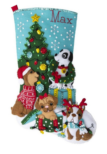 Bucilla Christmas felt stocking kit. Design features four dogs decorating a christmas tree and playing with decorations. 