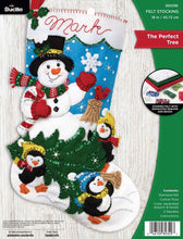 Load image into Gallery viewer, Bucilla felt christmas stocking kit. Design features a snowman waving as three penguins carry a cut christmas tree through the snow.  Edit alt text