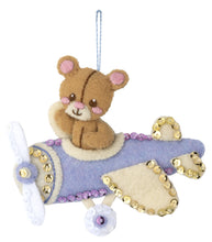 Load image into Gallery viewer, Purple airplane with teddy bear.