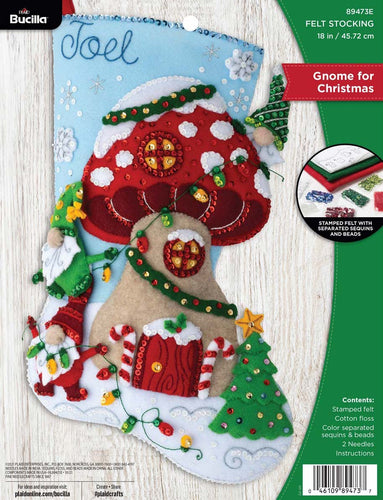 Bucilla christmas felt stocking kit. Design features gnomes decorating a mushroom house for Christmas.