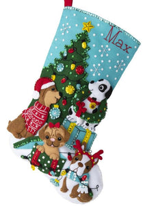 Bucilla Christmas felt stocking kit. Design features four dogs decorating a christmas tree and playing with decorations.