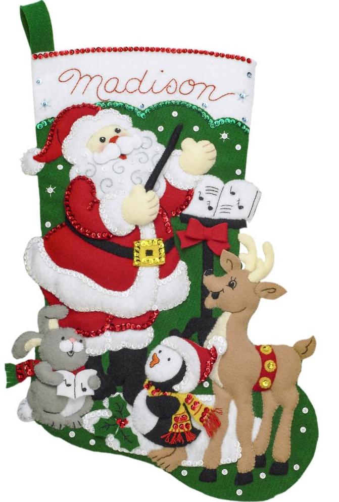 Bucilla felt christmas stocking kit. Design features Santa as the conductor of an animal choir. Deer, penguin, bunny.