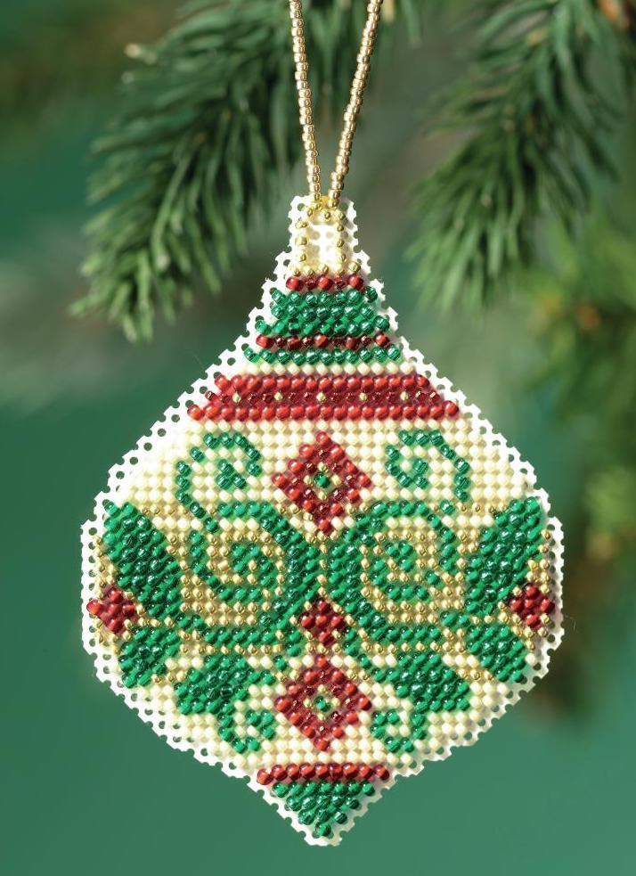 Mill Hill counted cross stitch ornament kit. Design features an ornament with a green flourish and red accents.