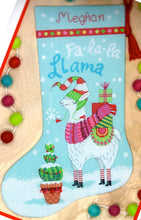 Load image into Gallery viewer, Dimensions counted cross stitch stocking kit. Design features a llama with gifts on his back and a cactus.