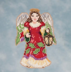 Mill Hill Beaded  counted cross stitch kit. The design features an angel in a red dress carrying a lantern. 
