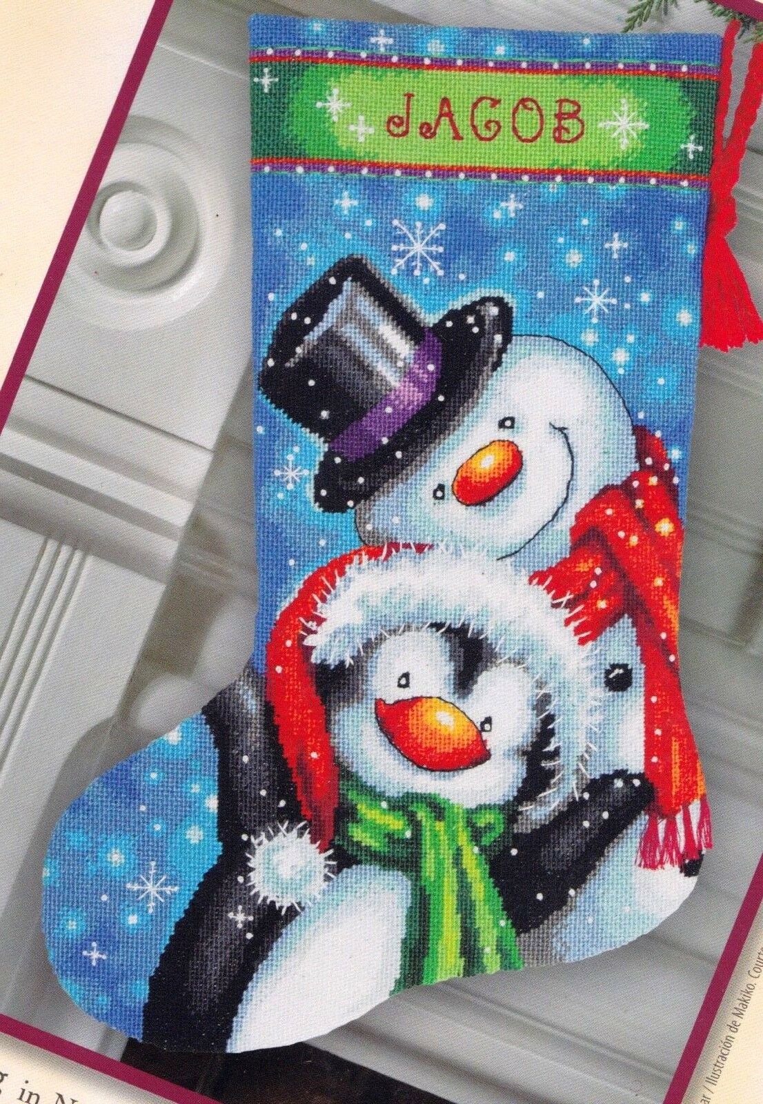 Dimensions needlepoint stocking kit. Design features a snowman and penguin out on a snowy day.