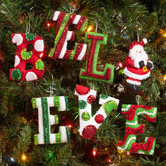 Bucilla Felt Christmas ornament kit. Design features felt letters that spell believe with the I being a santa.