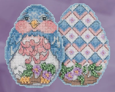 Mill Hill beaded counted cross stitch ornament kit.  The design features a bluebird shaped like a decorated Easter egg.