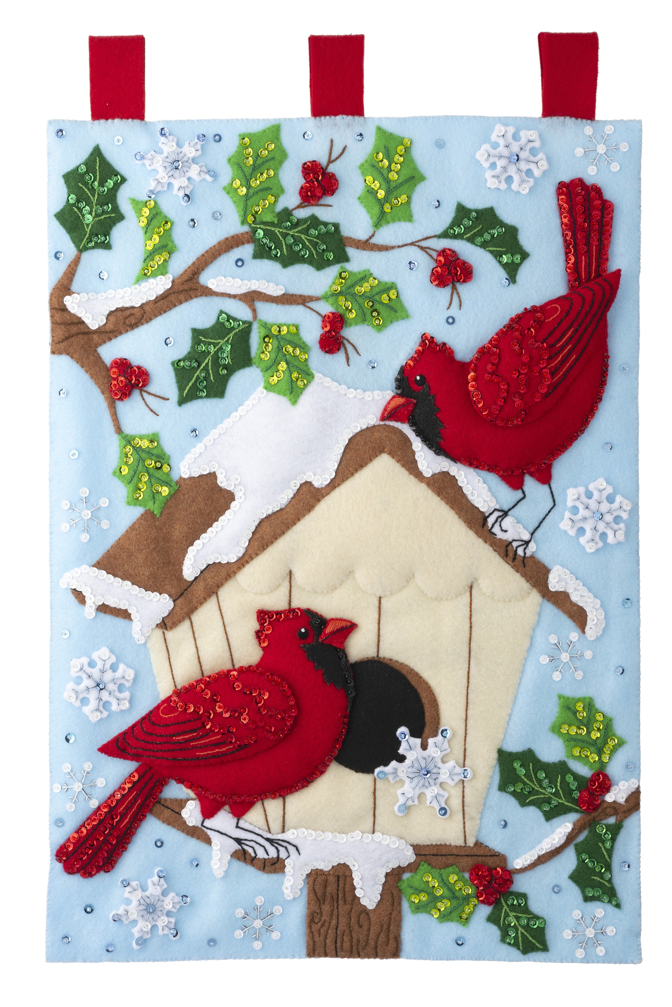 Bucilla felt wall hanging kit. Design features two cardinals and a birdhouse with trees and snow in the background.