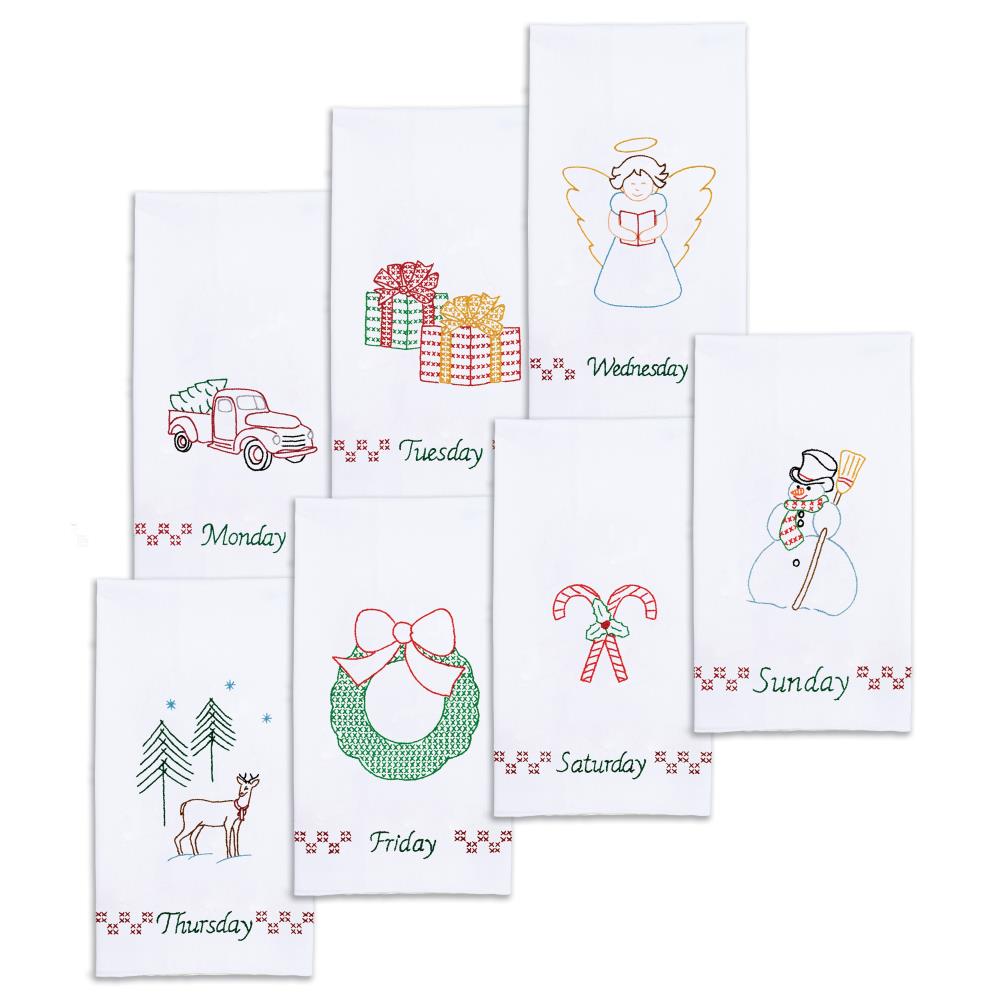 Decorative stamped for crosss stitch and embroidery. This design features 7 hand towels with christmas symbols on them.  Snowman, Angel, Gifts, Wreath, Deer, Candy Cane, Old Red Truck.
