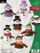 Load image into Gallery viewer, Bucilla felt ornament kit. Design features six snowmen with hats, scarves, and sweaters.