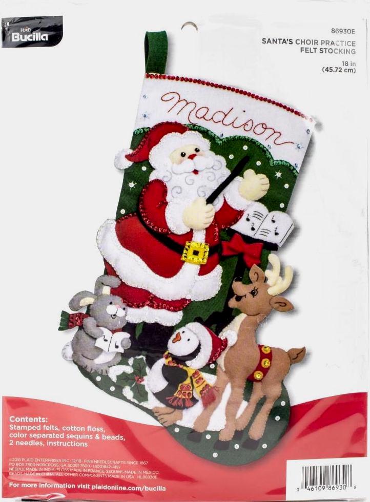 Bucilla felt christmas stocking kit. Design features Santa as the conductor of an animal choir. Deer, penguin, bunny.
