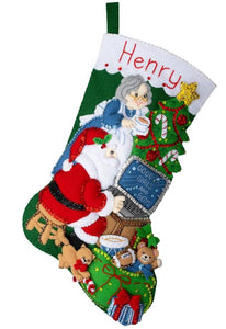 Bucilla felt stocking kit. Design features Santa on his computer with Mrs Claus watching over his shoulder.
