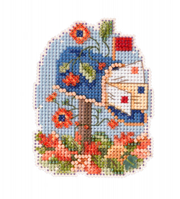 Mill Hill counted cross stitch kit. Design features a mailbox full of letters with fall flowers all around it.