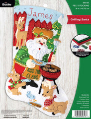 Bucilla felt christmas stocking kit. Design features Santa as the grillmaster serving up hotdogs, burgers and corn to his animals buddies.