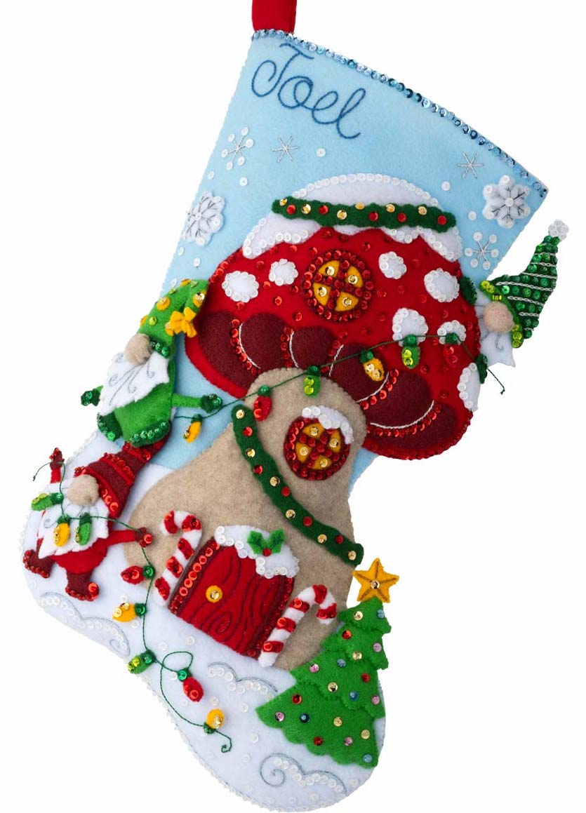 Bucilla christmas felt stocking kit. Design features gnomes decorating a mushroom house for Christmas.