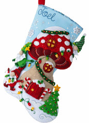 Bucilla christmas felt stocking kit. Design features gnomes decorating a mushroom house for Christmas.