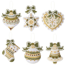 Load image into Gallery viewer, Bucilla felt Christmas ornament kit. Design features ornaments, stockings, snowflake, bell, heart. Colors used are green, white and cream.