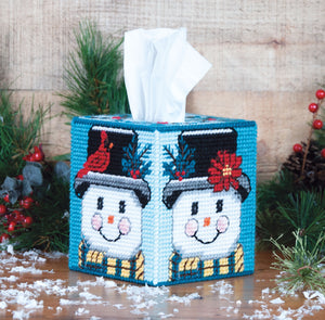 Plastic Canvas Tissue Box Cover Kit. This Design features Snowmen with winter decorated hats. 