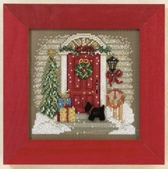 Mill Hill Beaded  counted cross stitch kit. The design features a front door decorated for christmas with a scottie dog in front.