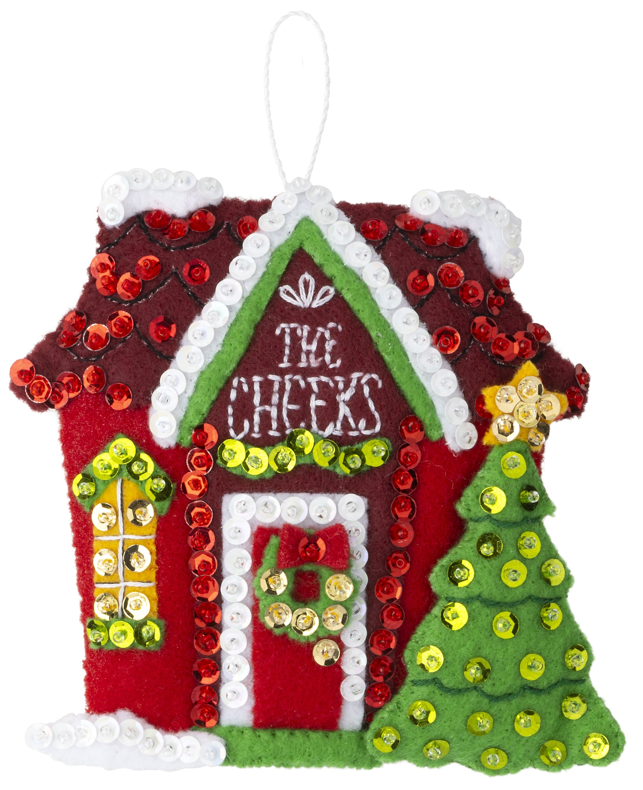 Bucilla Felt ornament kit. Design features  a red house decorated for Christmas with room to personalize the name at the top.