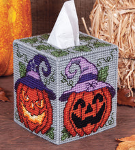 Load image into Gallery viewer, Plastic Canvas Tissue Box Cover Kit. This Design features halloween jack-o-lanterns with purple hats.