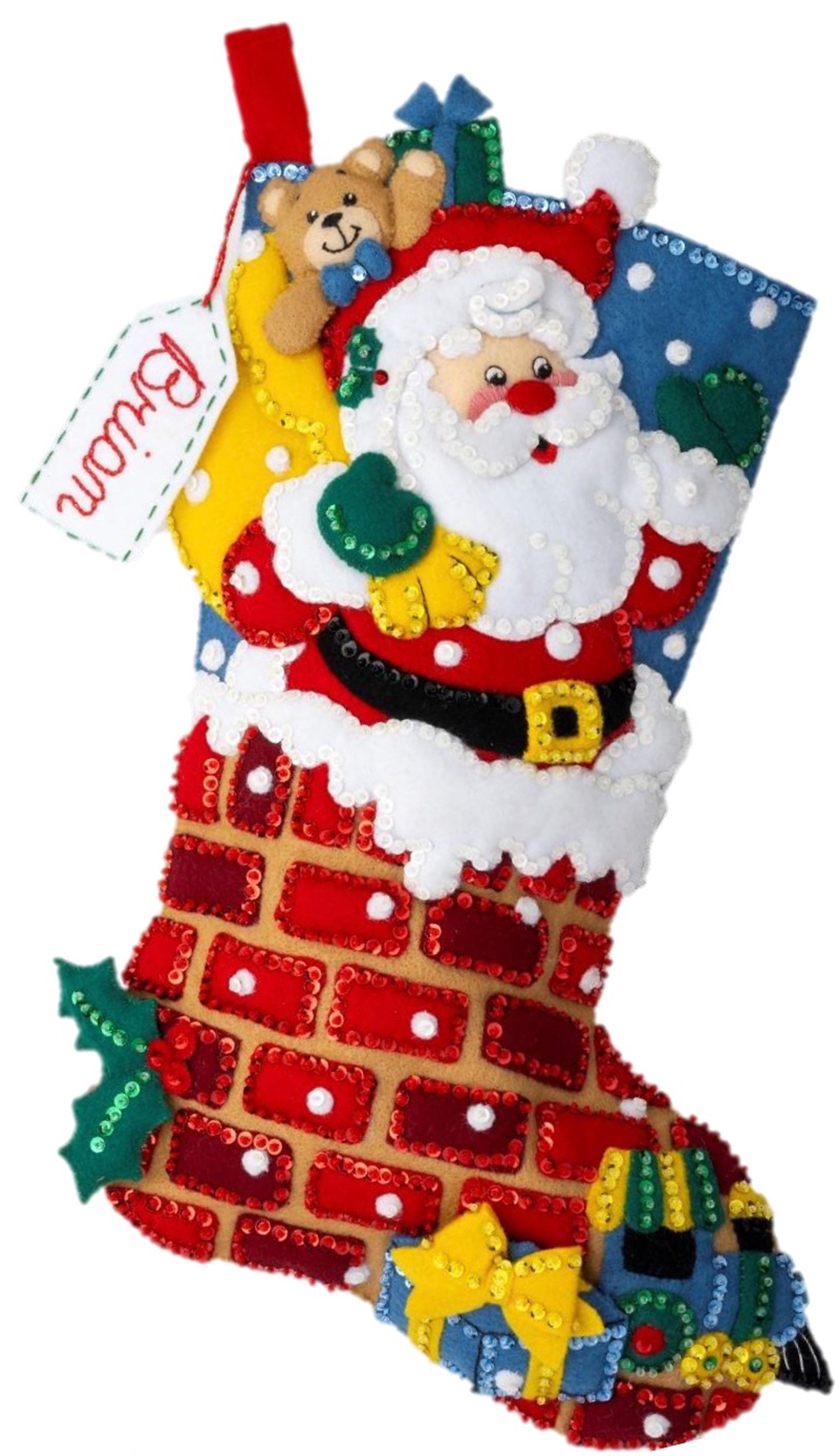 Bucilla Felt Christmas stocking kit. Design features santa with his bag of toys  heading down the chimney.
