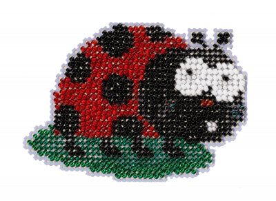 Mill Hill counted cross stitch ornament kit. Design features a lady bug.