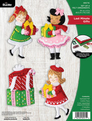 Bucilla felt ornament kit. Design features three girls holding gifts, and one double stacked gift ornament.