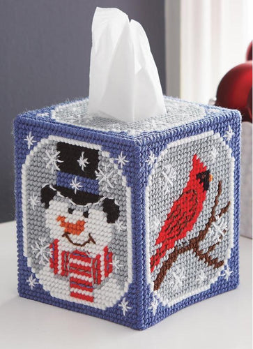 Mary Maxim Plastic Canvas tissue box kit. Design features  a snowman's and cardinal on the sides. 