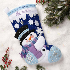 Bucilla felt Christmas stocking kit, Design features a snowman with snowflakes in the background.