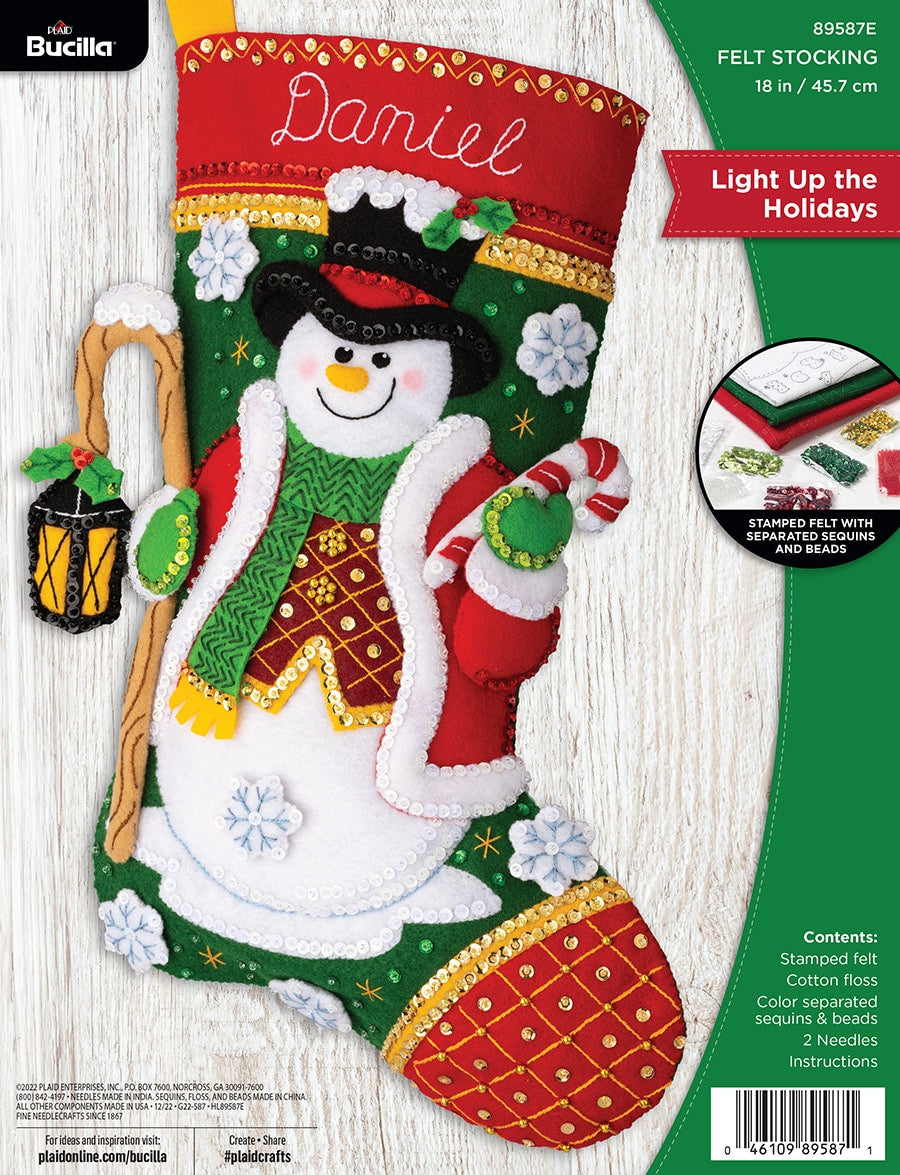 Bucilla felt Christmas stocking kit, Design features a snowman with lantern and candy cane.