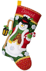 Bucilla felt Christmas stocking kit, Design features a snowman with lantern and candy cane.
