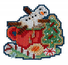 Mill Hill counted cross stitch kit. Design features a snowman melting into a cup of hot chocolate.