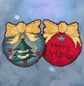 Mill Hill Sticks counted cross stitch kit. Design features a double sided ornament with merry christmas on one side and a christmas tree on the other.