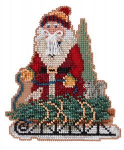 Mill Hill counted cross stitch kit. Design features Santa with a Norway spruce tree on a sled. 
