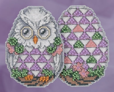 Mill Hill beaded counted cross stitch ornament kit.  The design features a owl shaped like a decorated Easter egg.