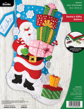 Load image into Gallery viewer, Bucilla felt stocking kit. Design features santa carrying a handful of gifts on a snowy day.