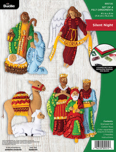 Bucilla felt ornament kit. Design features four ornaments depicting the  Nativity Scene.  An angel, three wise men, Mary, Joseph and the baby, and a camel and sheep.