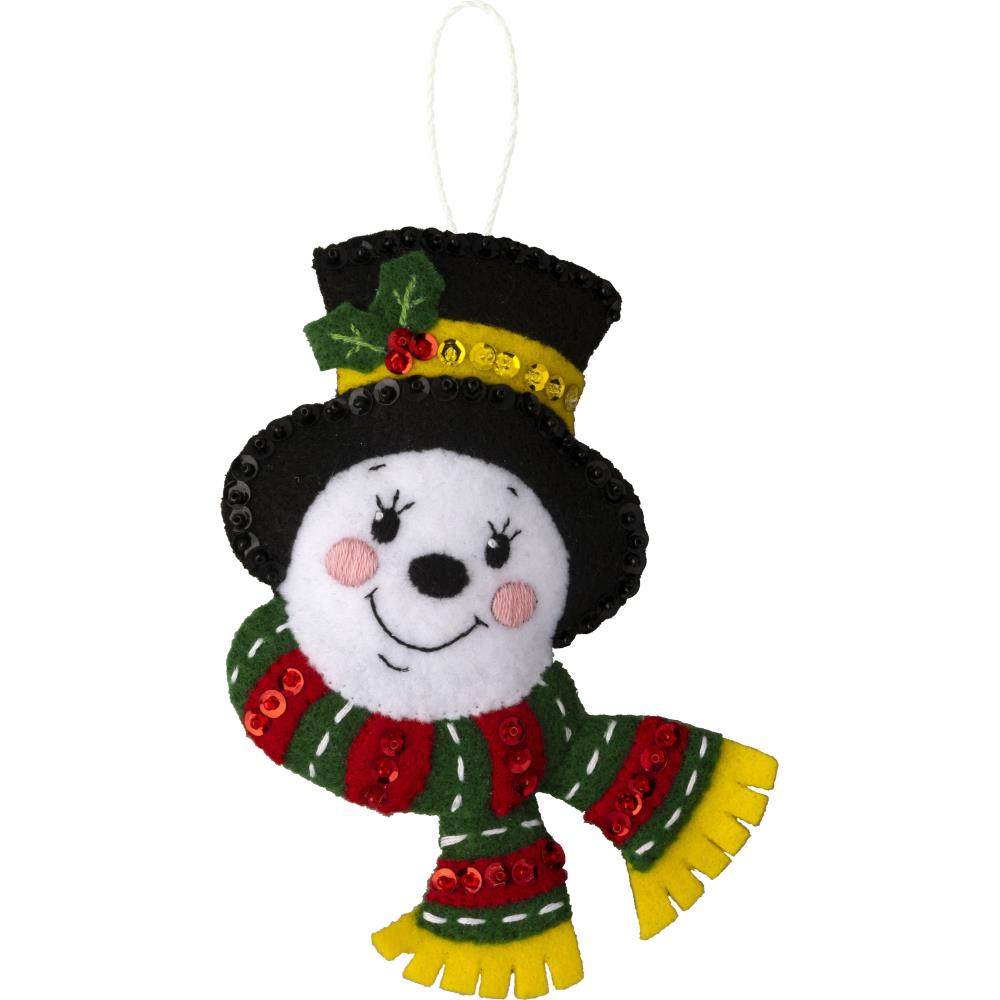 Snowman face with scarf and hat.