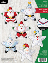 Bucilla felt ornament kit. Design features six star shaped ornaments. Two santa face ornaments. Two red and green santa ornaments. Two blue and white santa ornaments.