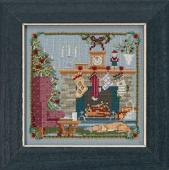 Mill Hill counted cross stitch kit. Design is a living room with stockings hung from the fireplace. 