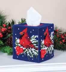 Plastic Canvas Tissue Box Cover Kit. This Design features a Cardinal sitting on a snowy branch with a deep blue background.