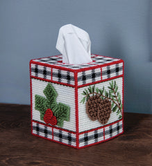 Plastic Canvas Tissue Box Cover Kit. This Design features a red, black and white plaid with winter leaves and pinecones. 